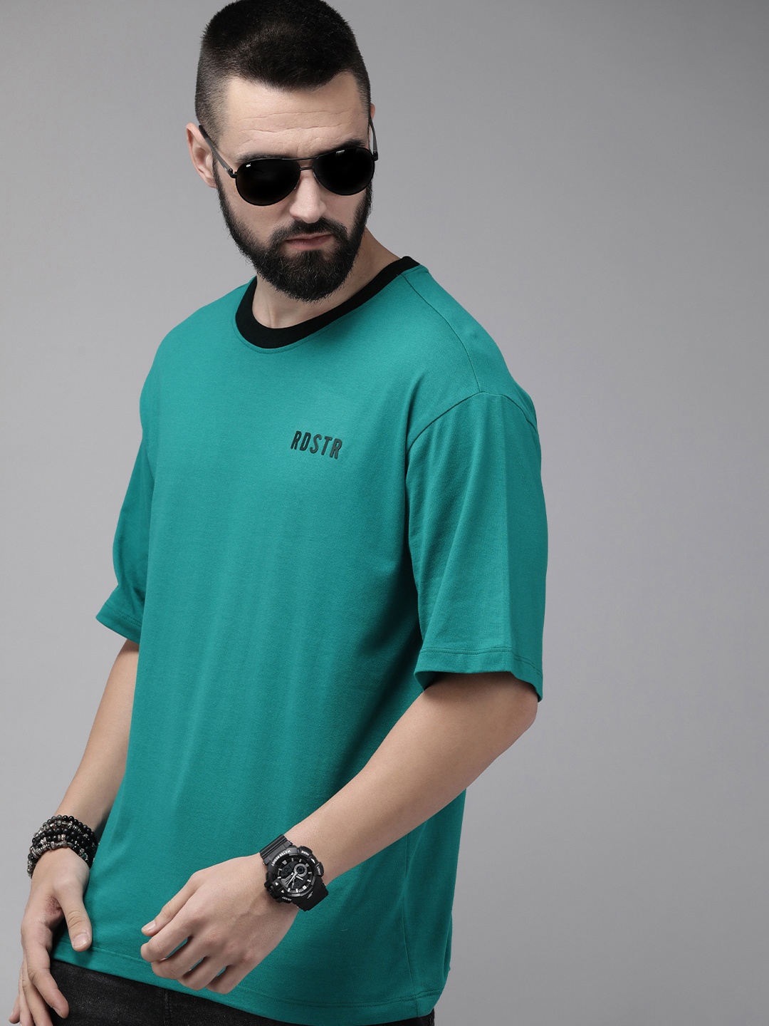 

Roadster Men Solid Oversized T-shirt, Green