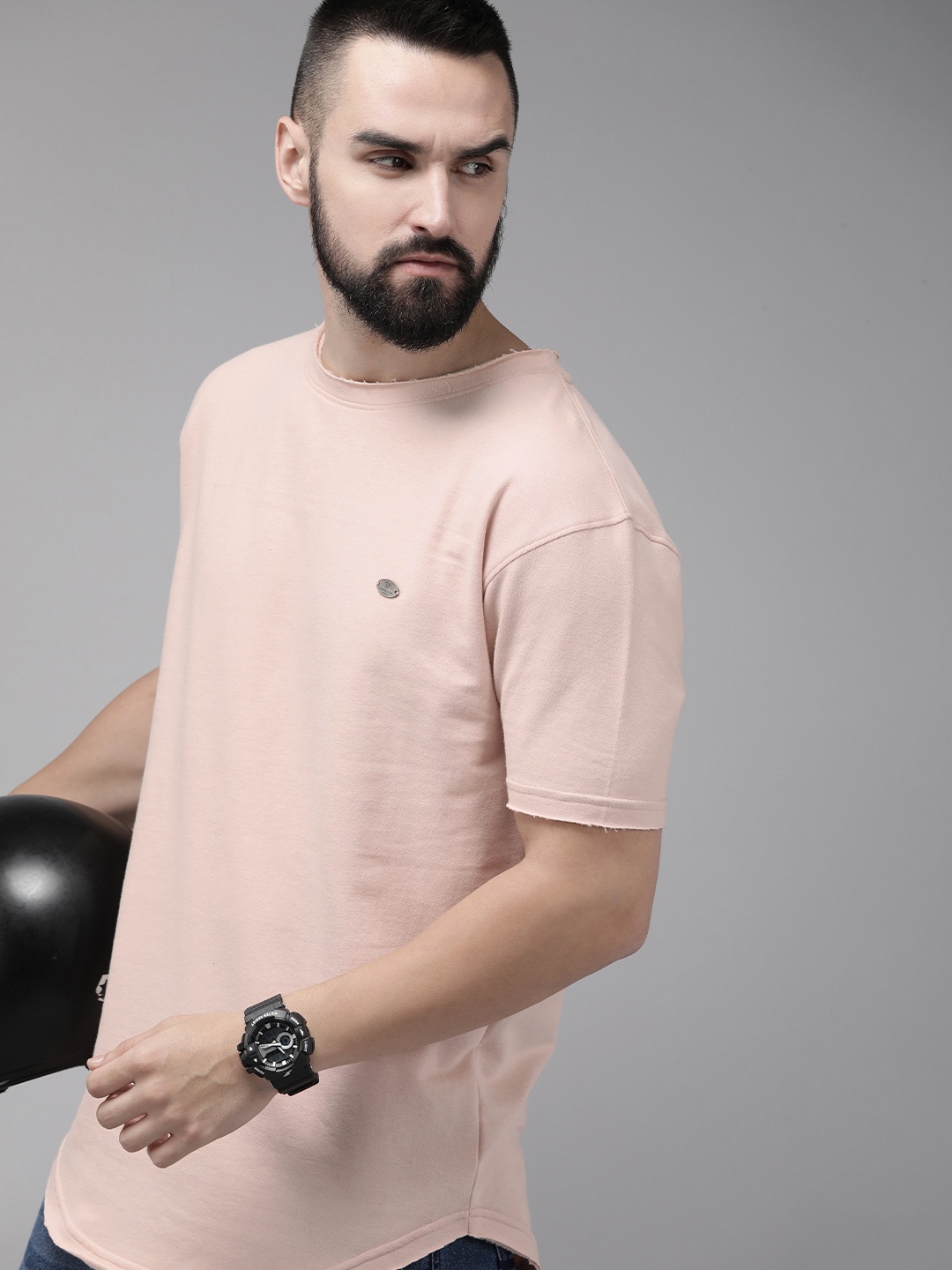 

Roadster Men Solid Regular Fit T-shirt, Peach