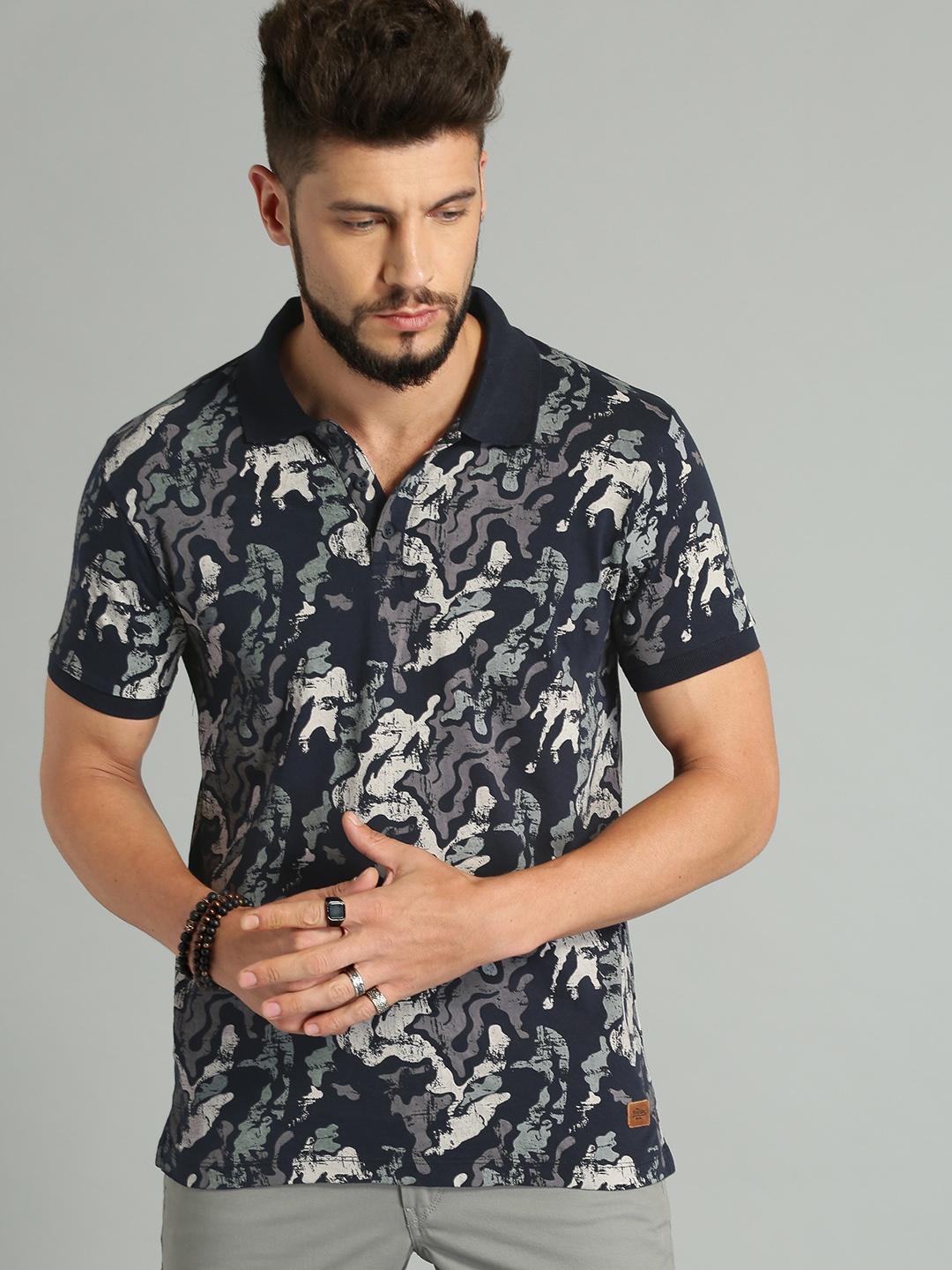 

Roadster Men Navy Blue All-Over-Printed Polo Pure Cotton T-shirt