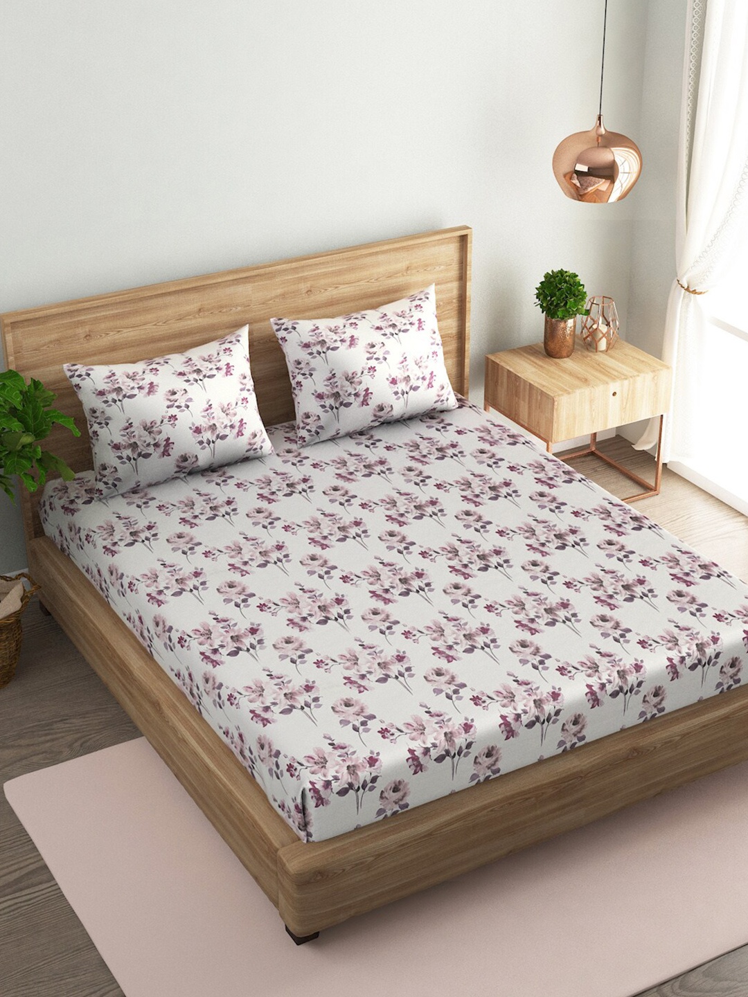 

Naksh Pink & White Floral 186 TC King Bedsheet with 2 Pillow Covers