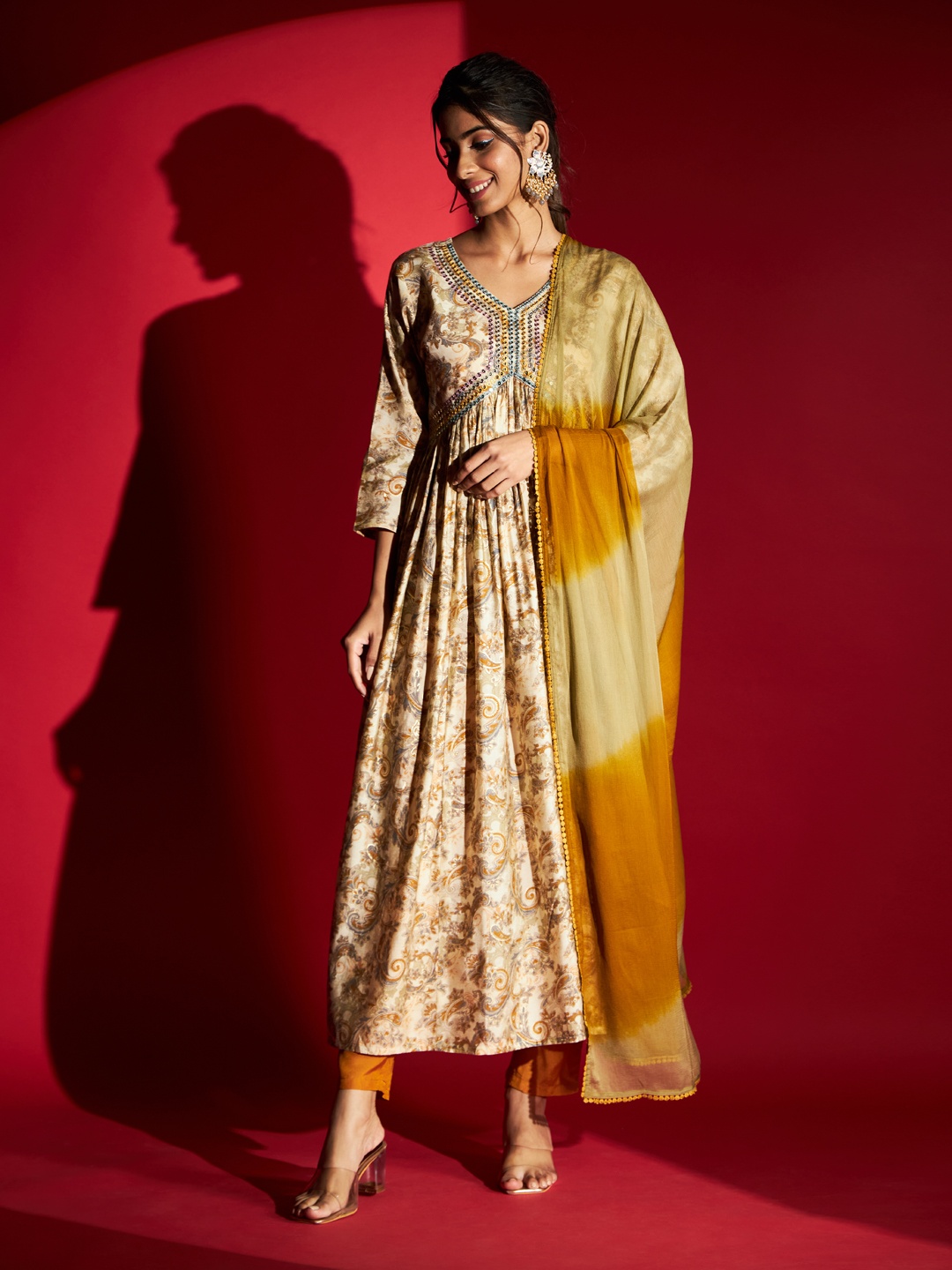 

Navlik Floral Printed Regular Sequinned Kurta with Trousers & Dupatta, Mustard