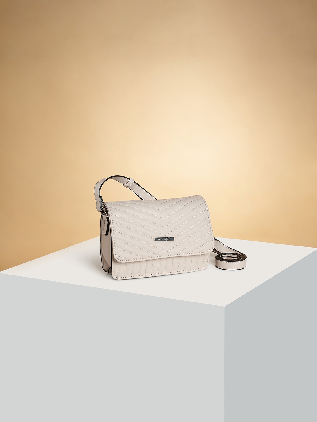 

Forever Glam by Pantaloons Textured PU Structured Sling Bag with Bow Detail, Off white