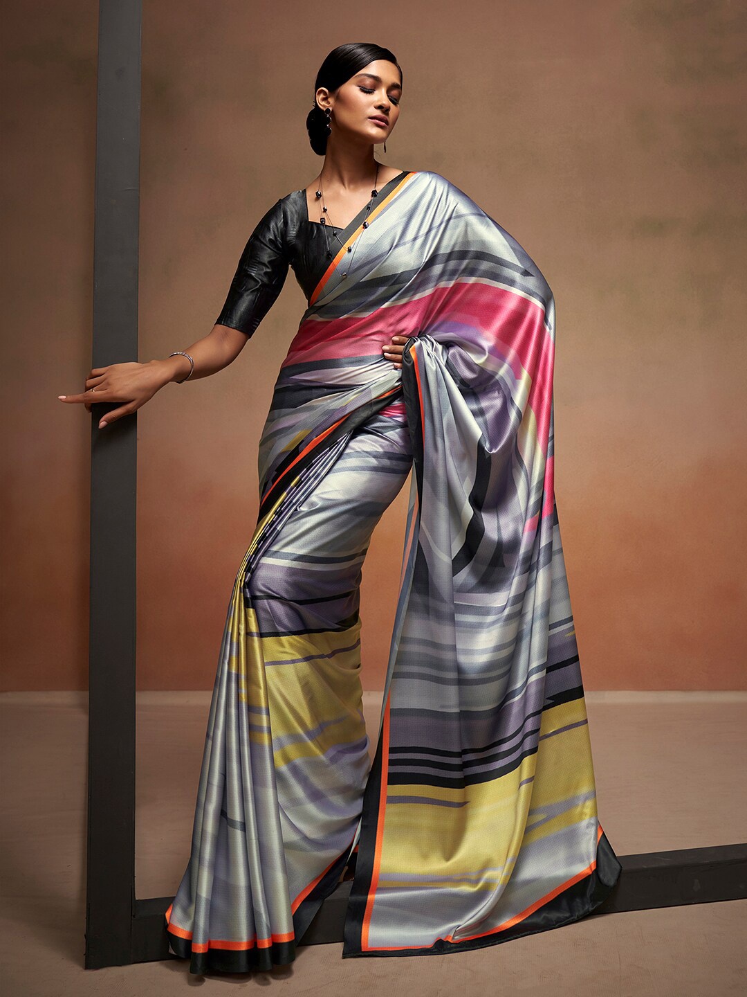 

Satrani Grey Printed Striped Satin Saree