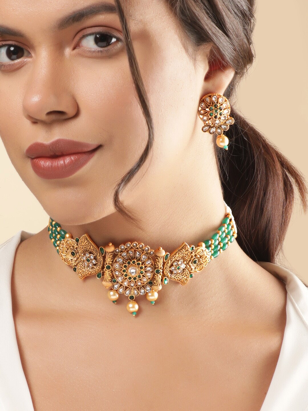 

Rubans Gold-Plated Emeral & Kundan Stone-Studded & Pearl Beaded Choker Jewellery Set