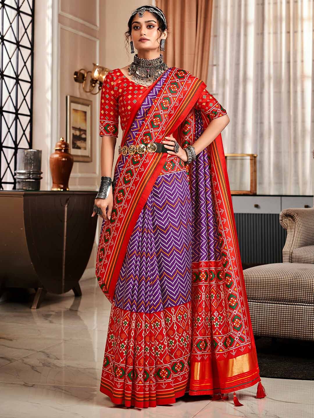 

Satrani Purple & Red Ethnic Motif Printed Zari Saree