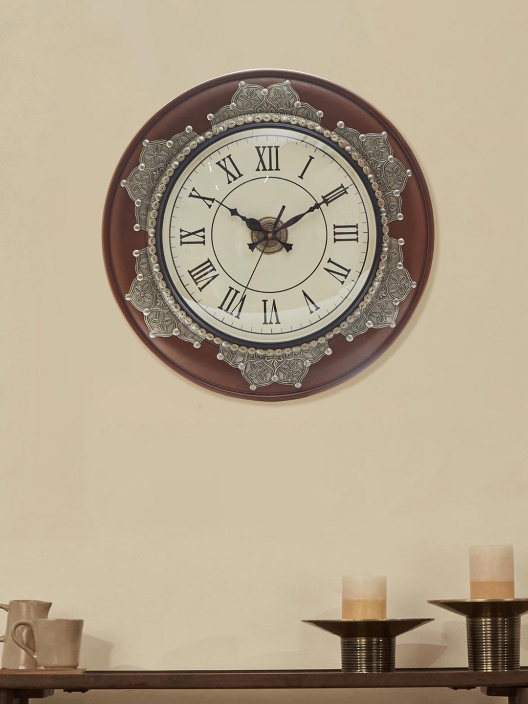 

Fabindia Brown Embellished Contemporary Wall Clock