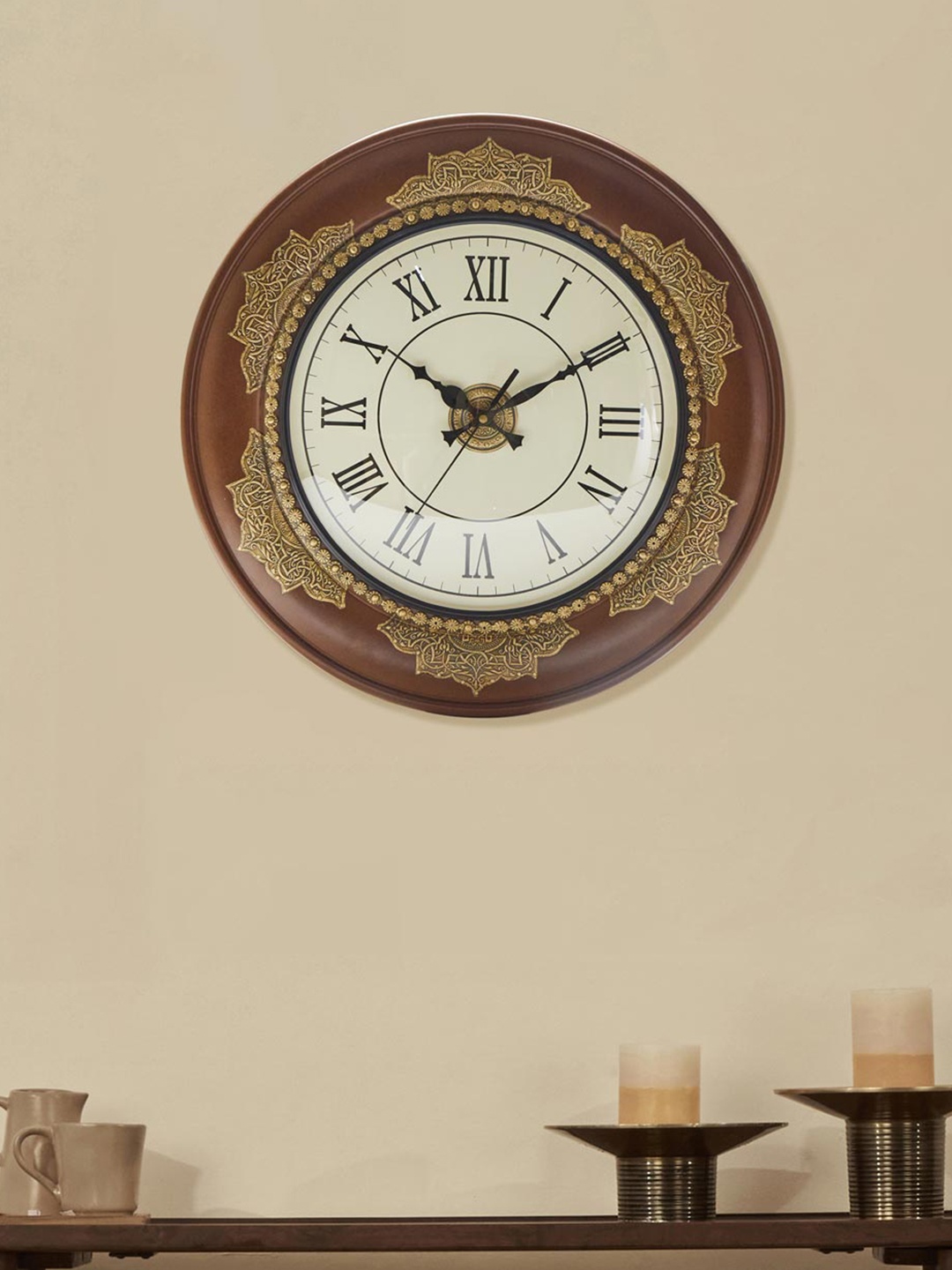 

Fabindia Brown & Gold-Toned Embellished Traditional Wall Clock