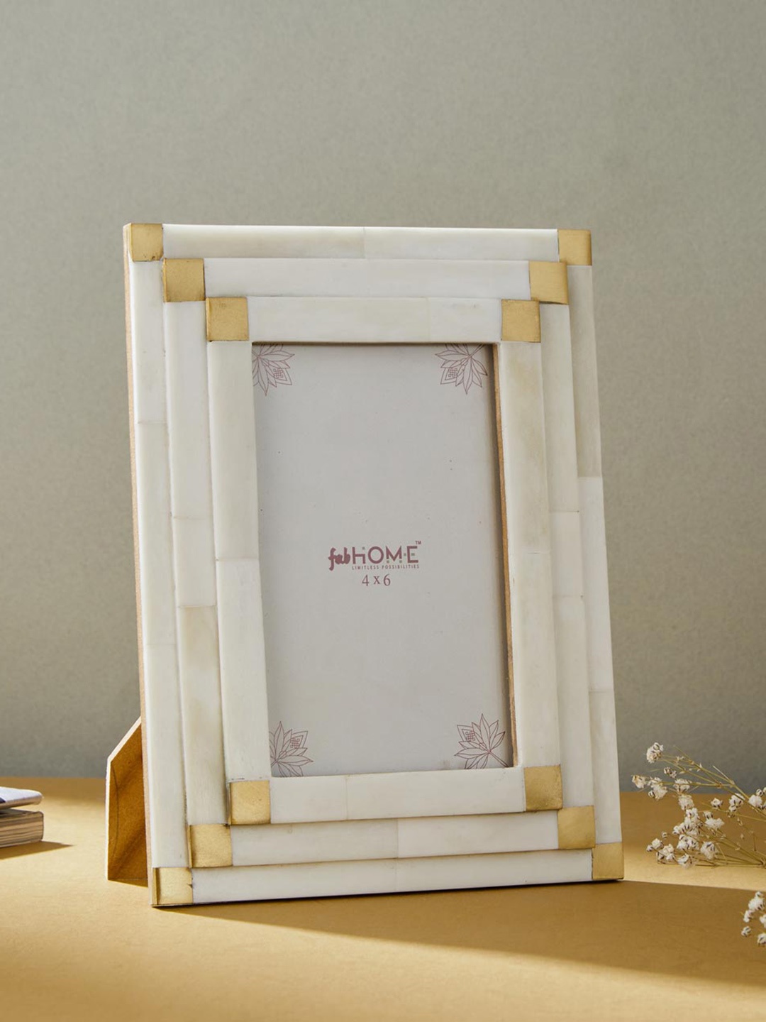 

Fabindia Mithya White Wooden Photo Frame