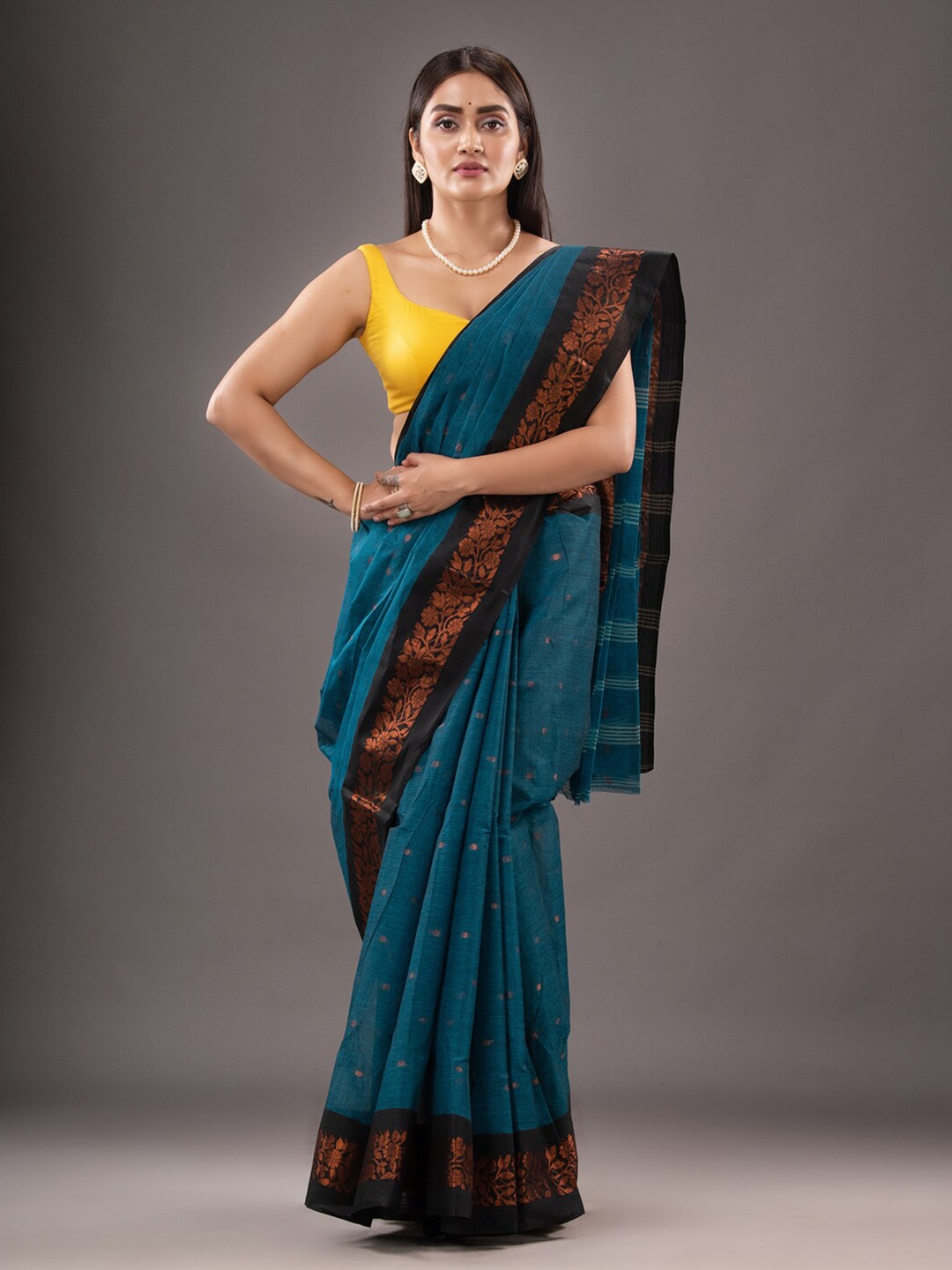 

Mitera Blue & Black Geometric Woven Design Zari Pure Cotton Taant Saree