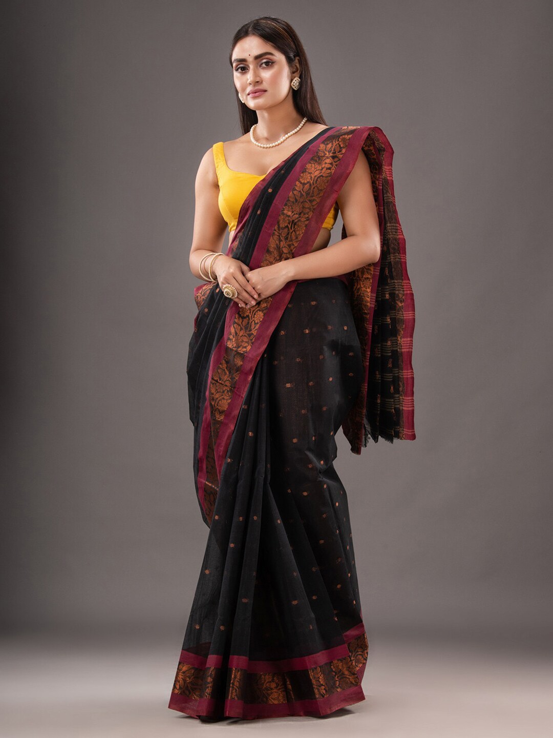 

Mitera Black & Purple Woven Design Zari Pure Cotton Taant Saree