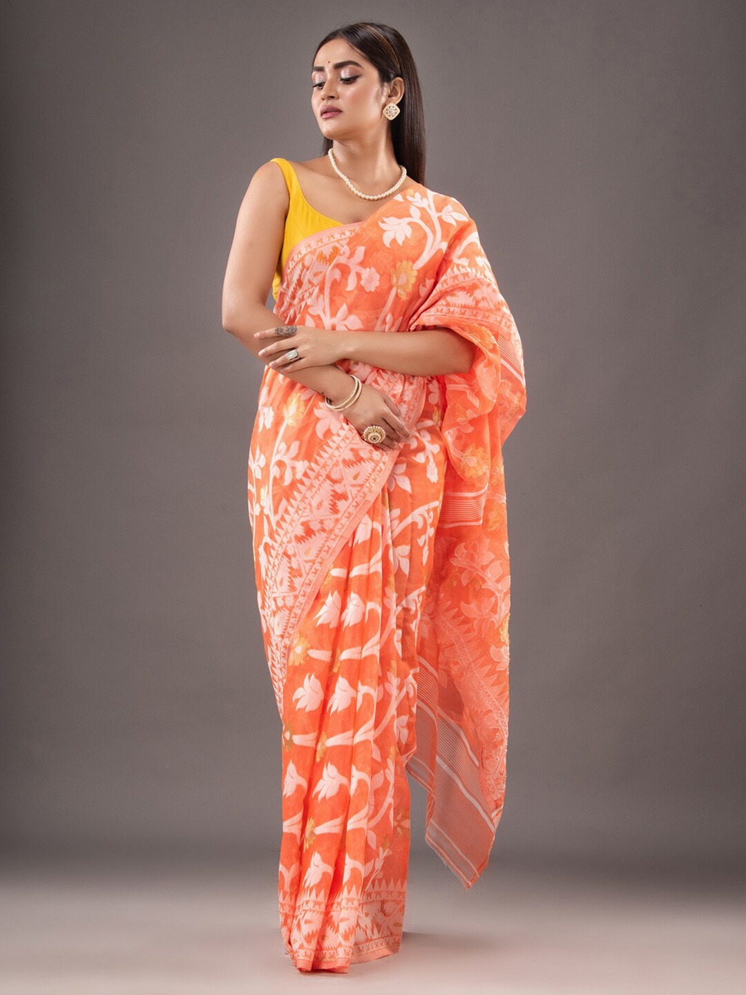 

Mitera Orange & White Woven Design Silk Cotton Jamdani Saree