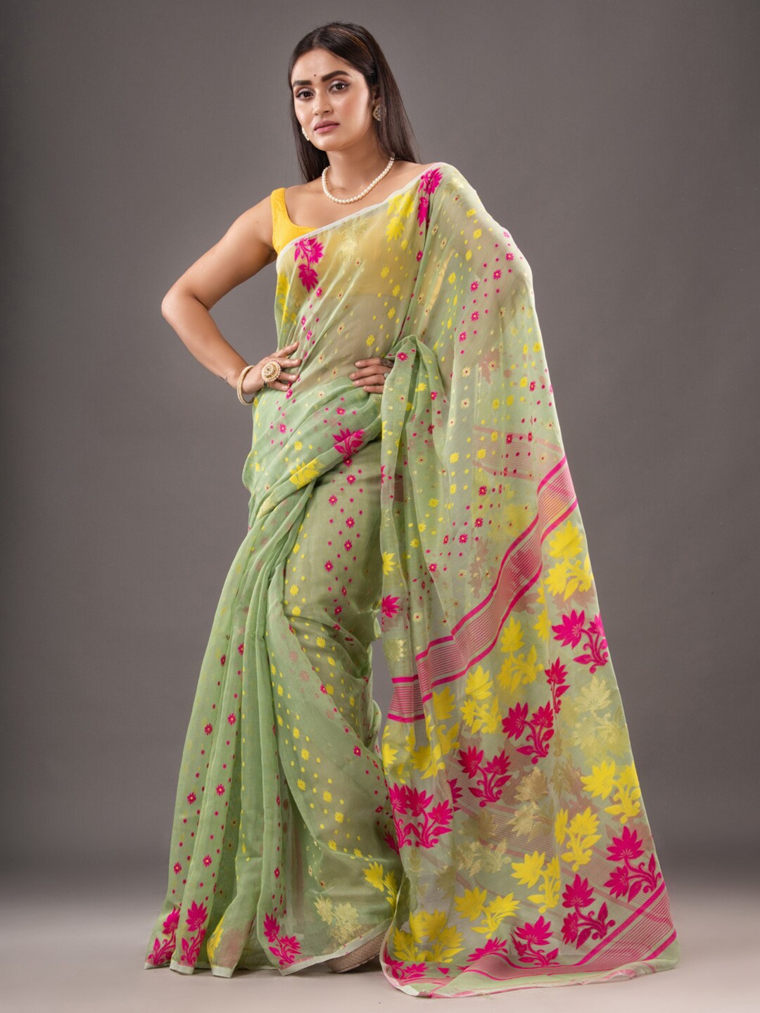 

Mitera Green & Pink Woven Design Zari Silk Cotton Jamdani Saree
