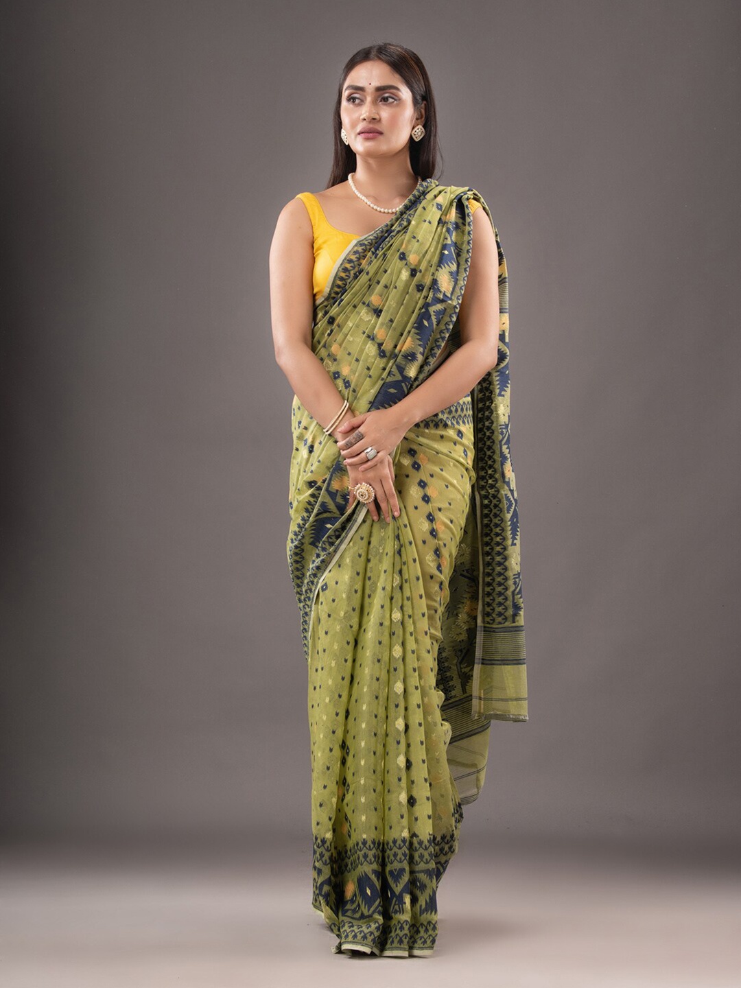 

Mitera Olive Green & GreenEthnic Motifs Woven Design Silk Cotton Jamdani Saree