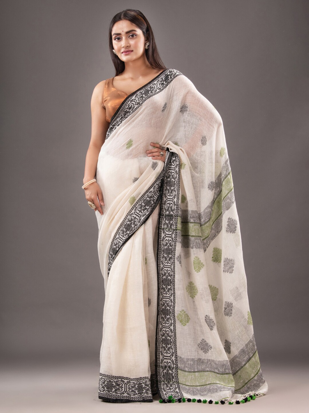 

Mitera Off White Floral Woven Design Pure Linen Saree