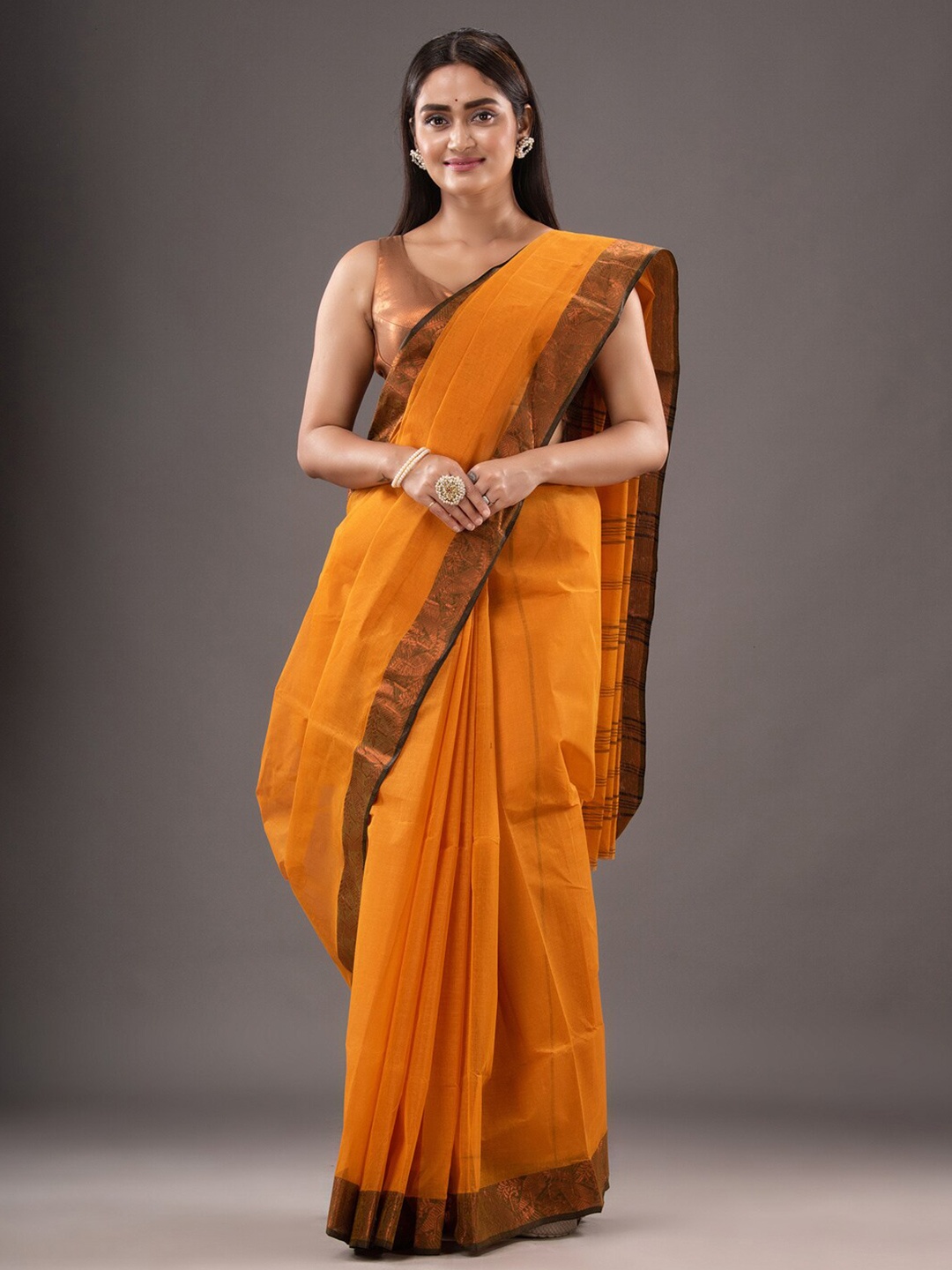 

Mitera Mustard & Black Zari Pure Cotton Taant Saree