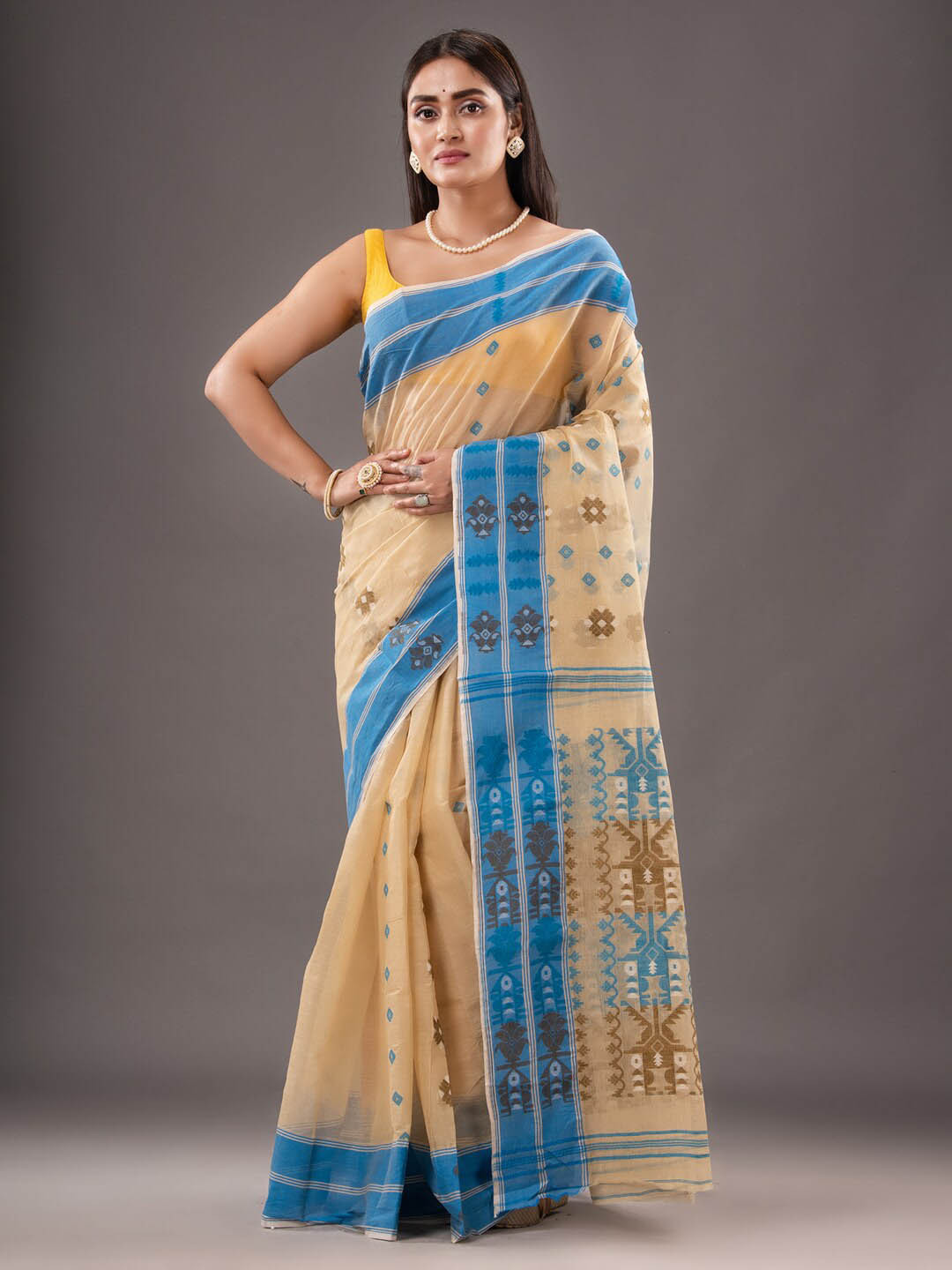 

Mitera Beige & Blue Ethnic Motifs Woven Design Pure Cotton Jamdani Saree
