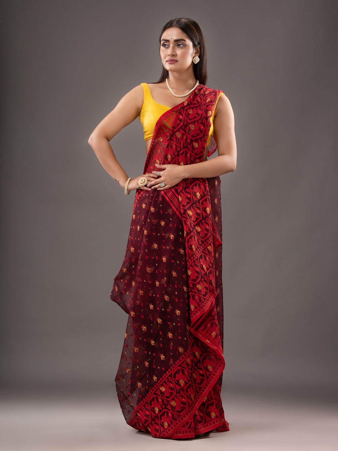 

Mitera Maroon Floral Woven Design Silk Cotton Jamdani Saree