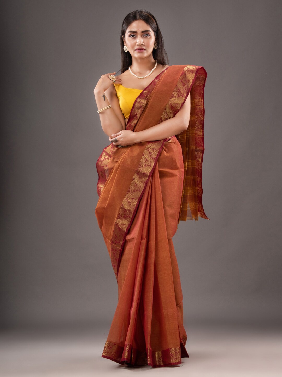 

Mitera Ethnic Motifs Woven Design Zari Pure Cotton Taant Saree, Rust