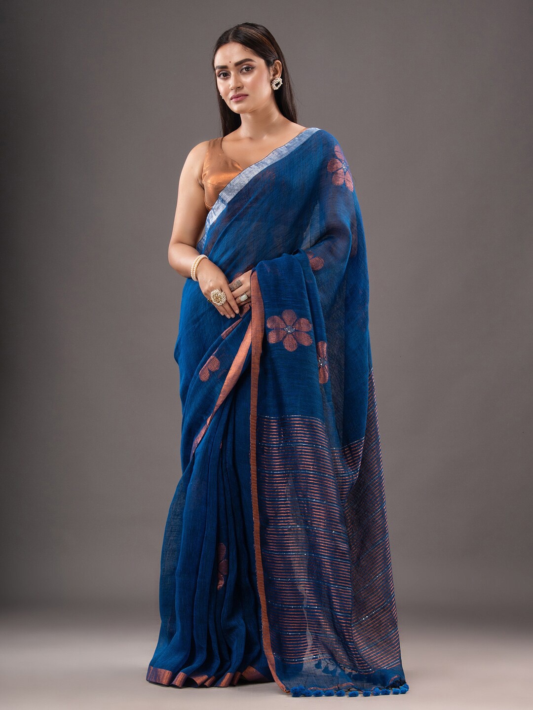 

Mitera Blue & Copper-Toned Floral Woven Design Zari Pure Linen Saree