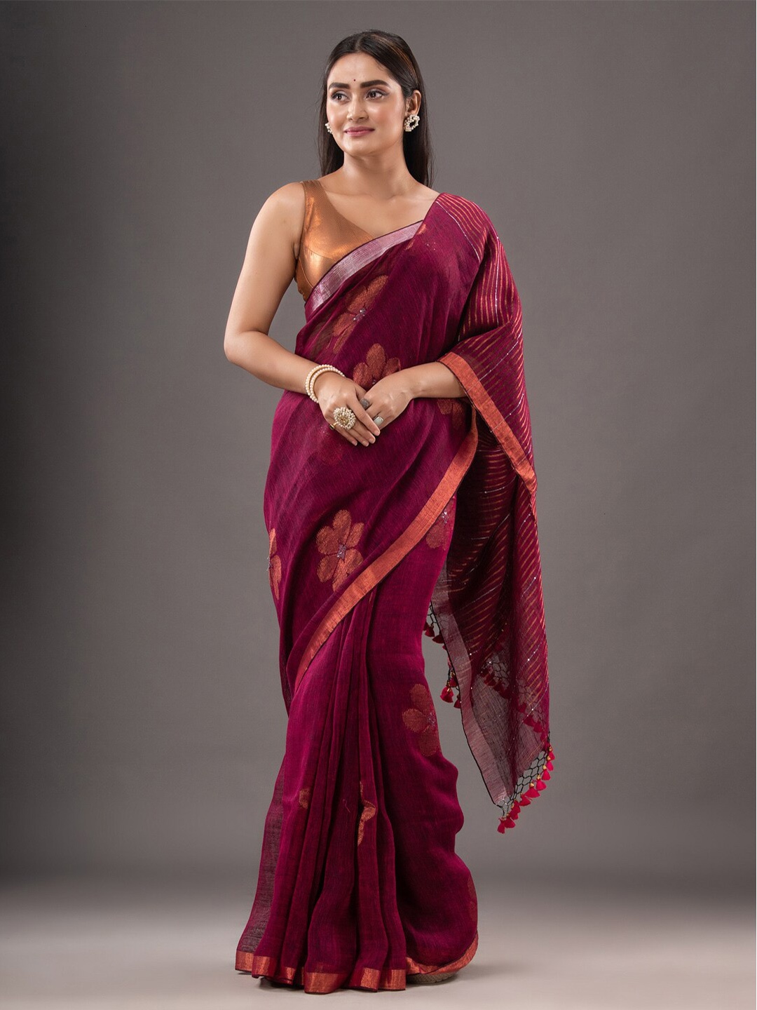 

Mitera Magenta Floral Woven Design Zari Pure Linen Saree