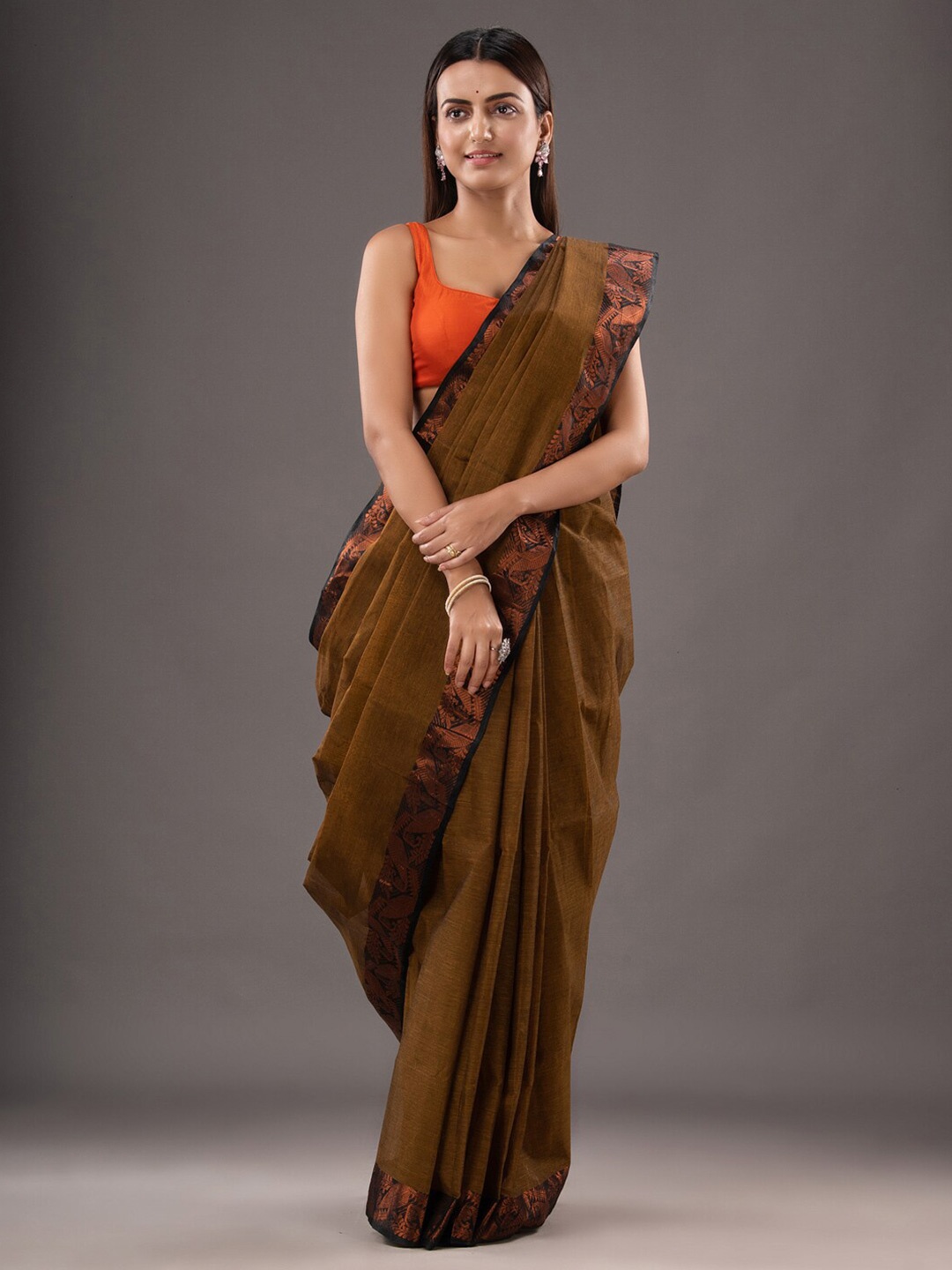 

Mitera Brown & Blue Zari Pure Cotton Taant Saree