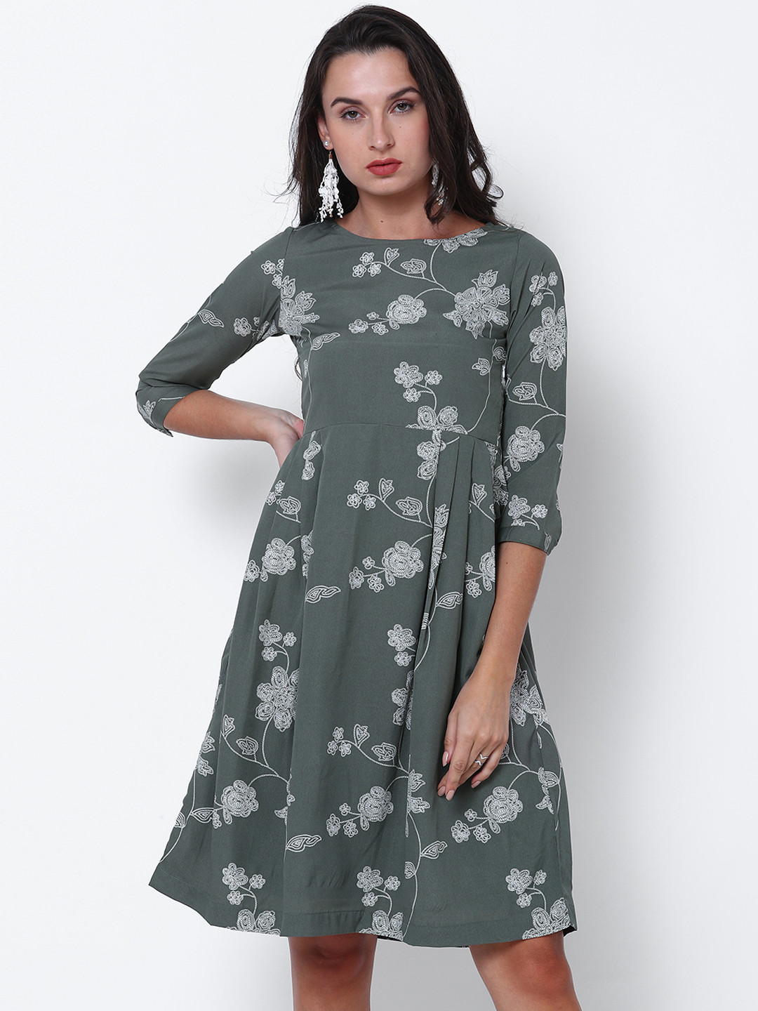 

Tokyo Talkies Women Green Printed Fit and Flare Dress