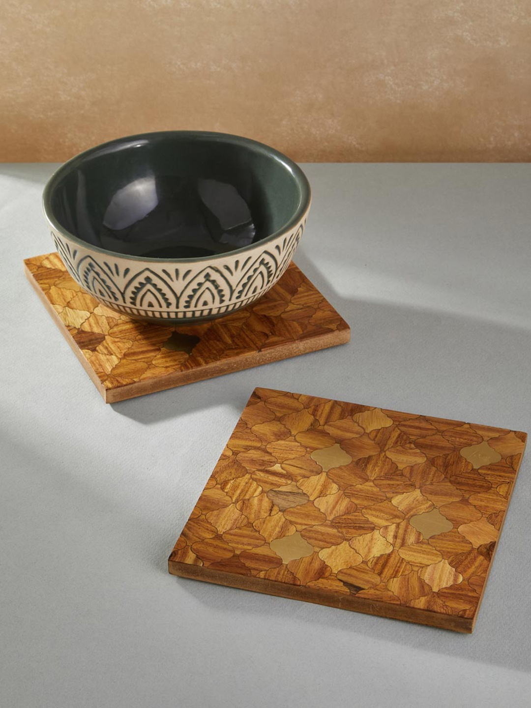 

Fabindia Brown 2 Pieces Printed Wooden Coasters