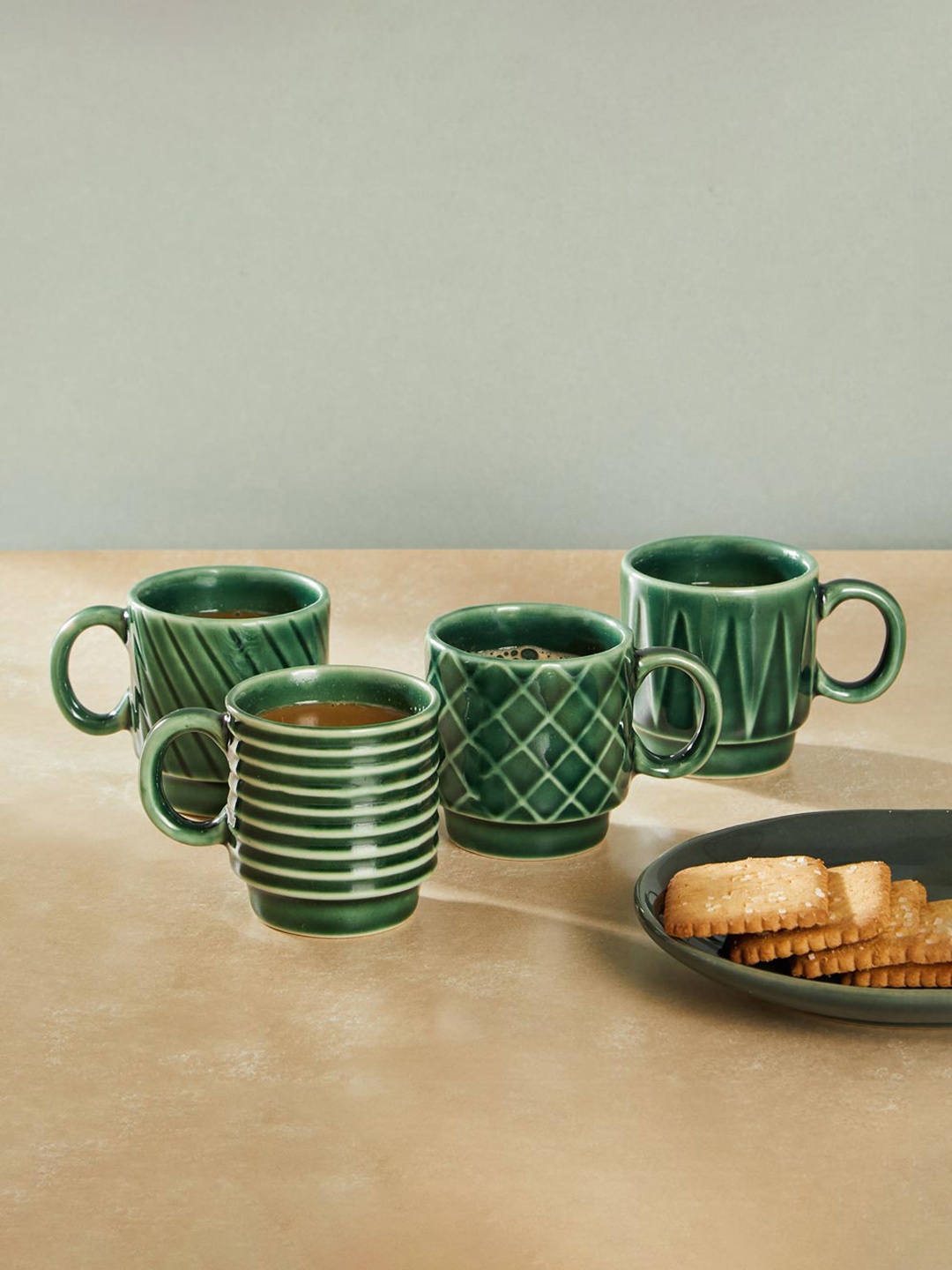 

Fabindia Aavegh 4 Pcs Green Textured Ceramic Glossy Cups - 90 ML Each
