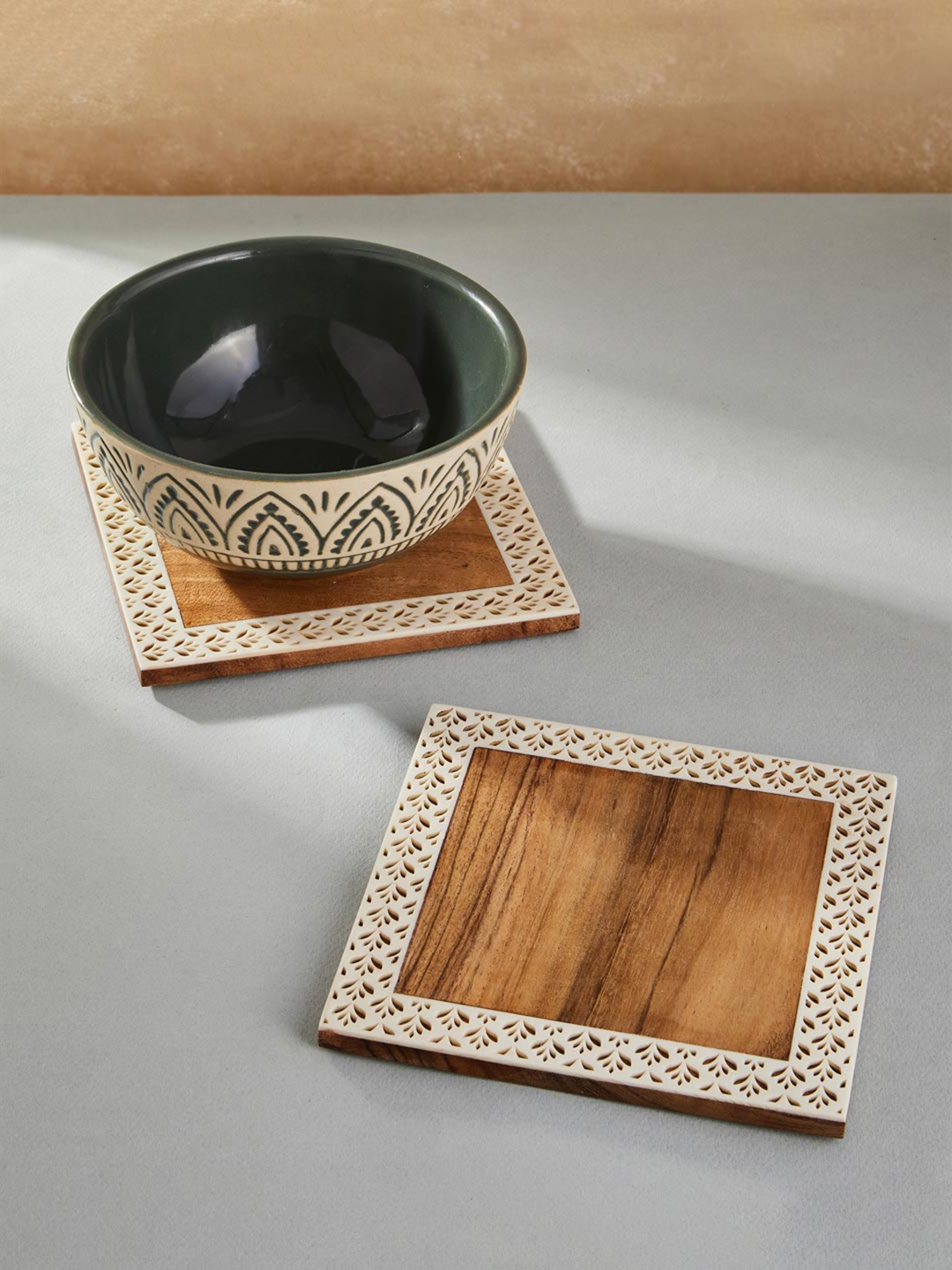 

Fabindia Brown 2-Pieces Textured Wooden Coasters