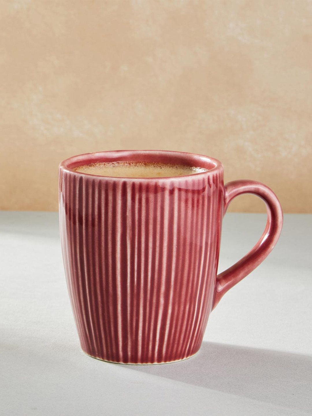 

Fabindia Naqaash Red Textured Ceramic Matte Mug - 310 ML