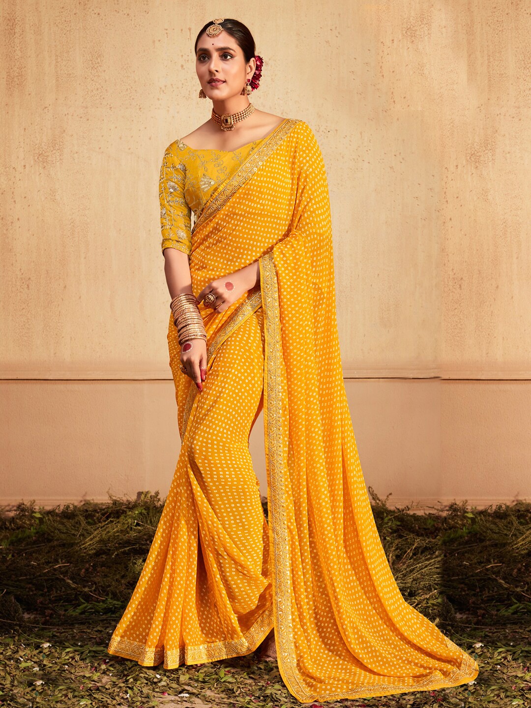 

Anouk Yellow Bandhani Printed Zari Pure Georgette Leheriya Saree