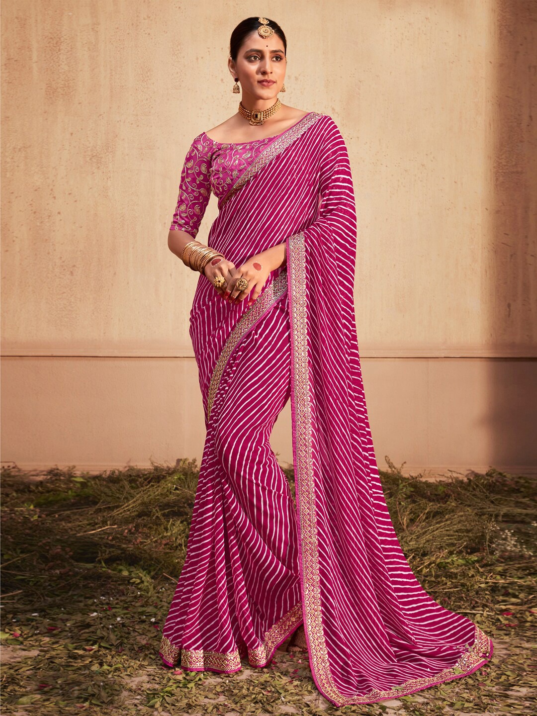

Anouk Magenta Striped Printed Sequinned Pure Georgette Leheriya Saree