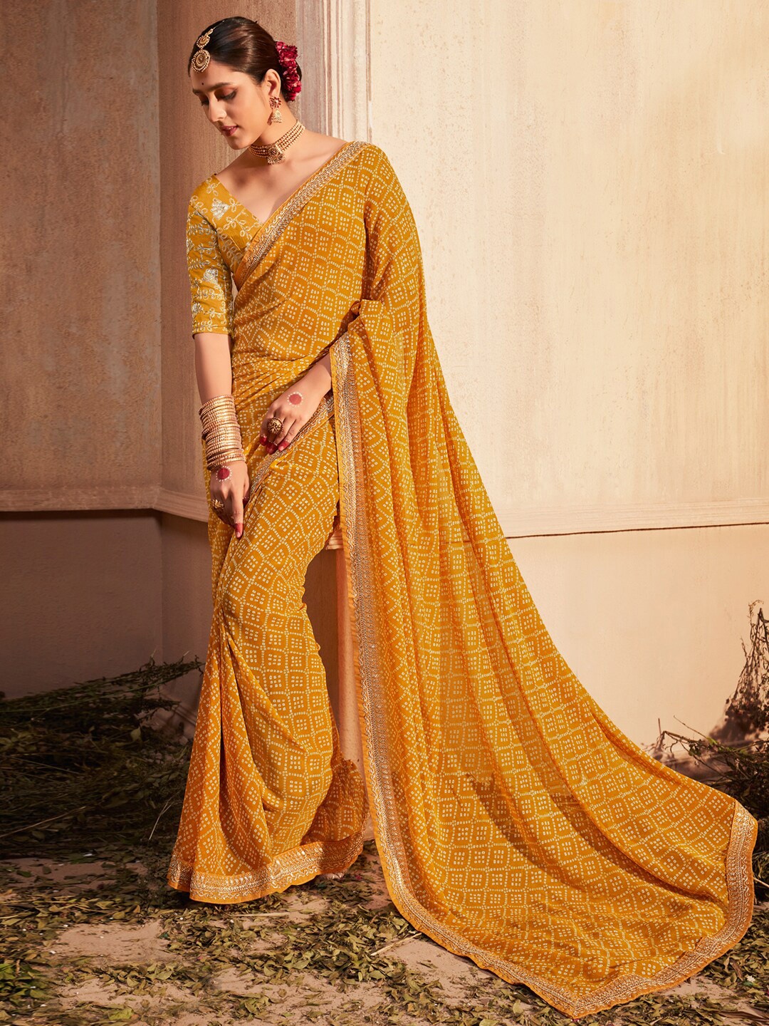 

Anouk Mustard Bandhani Printed Zari Pure Georgette Leheriya Saree