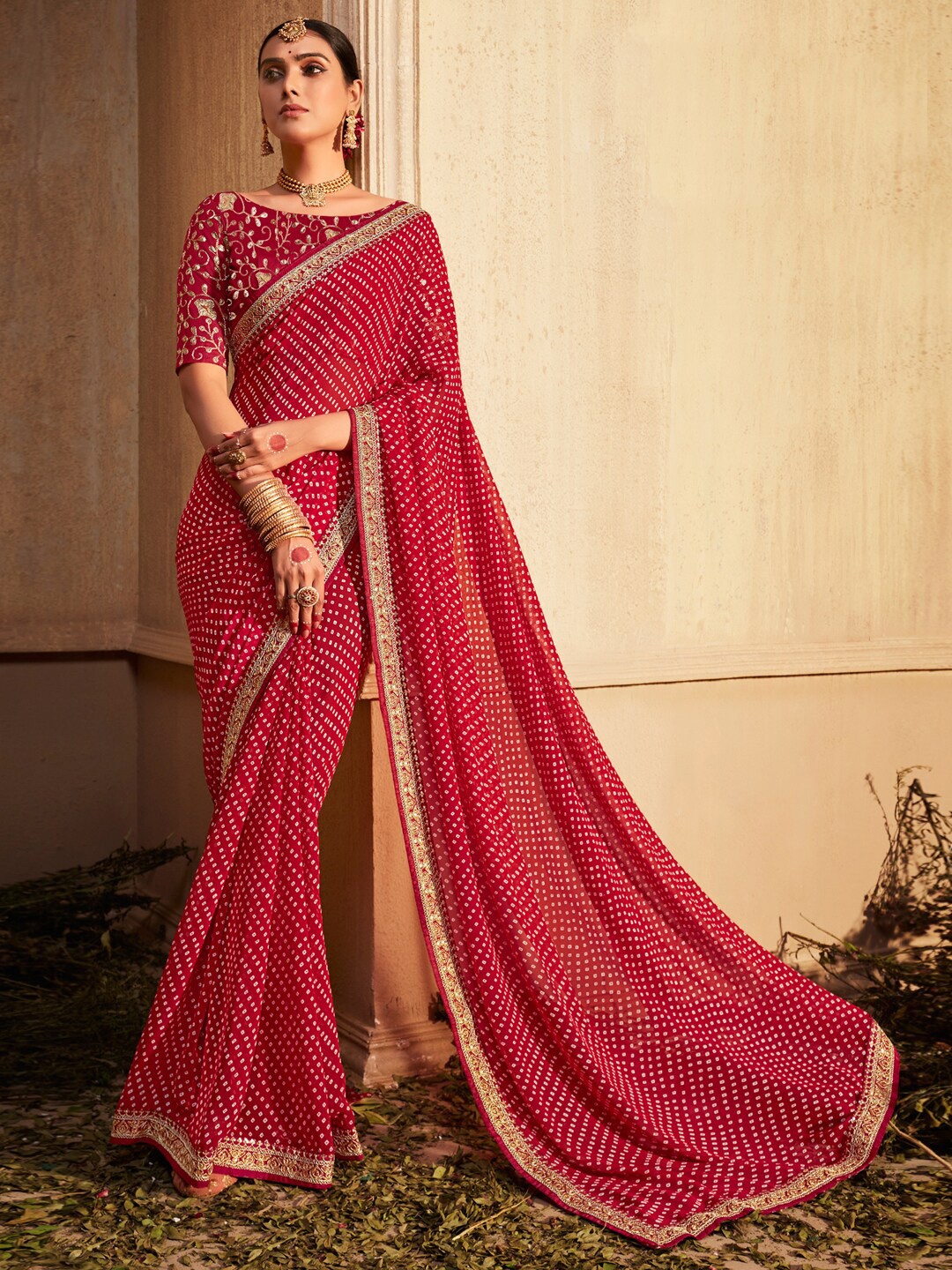 

Anouk Pink Bandhani Printed Zari Pure Georgette Leheriya Saree