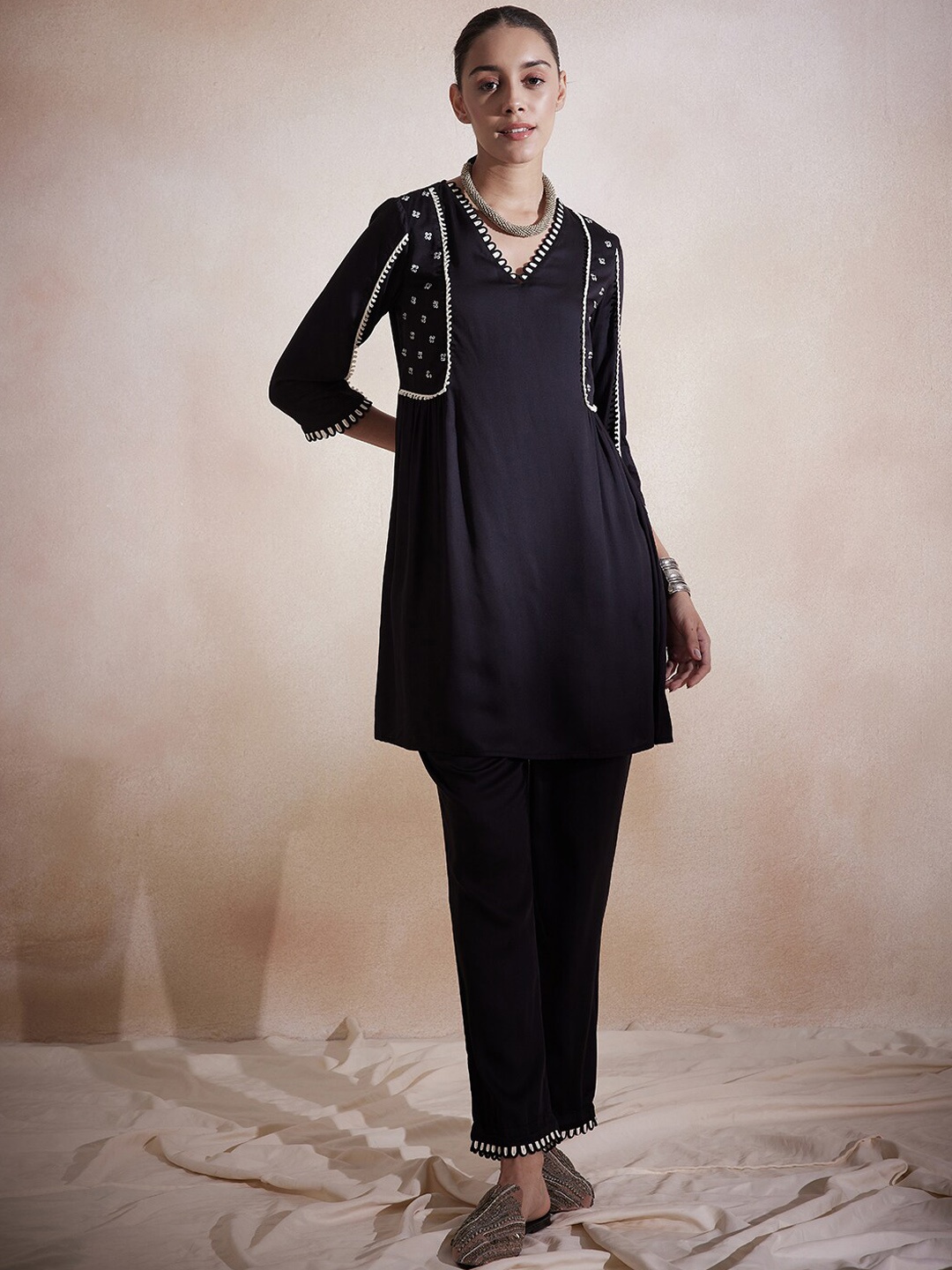 

Femella V-neck Thread Work A-Line Kurti With Trousers, Black