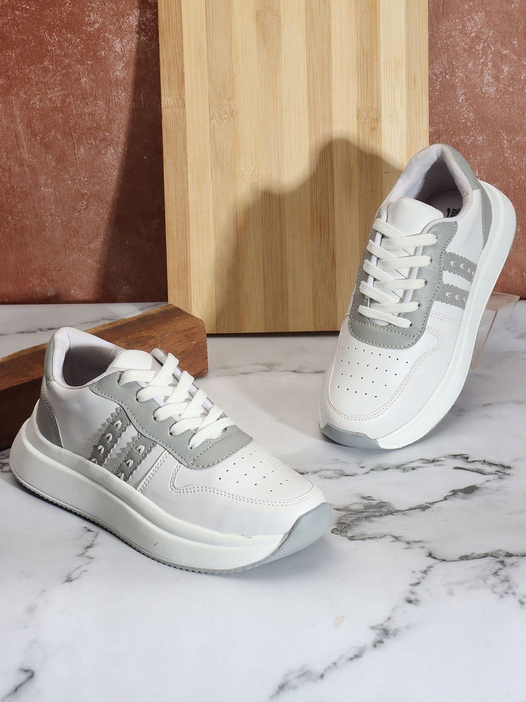 

The Roadster Lifestyle Co. Women White & Grey Perforations Lightweight Sneakers