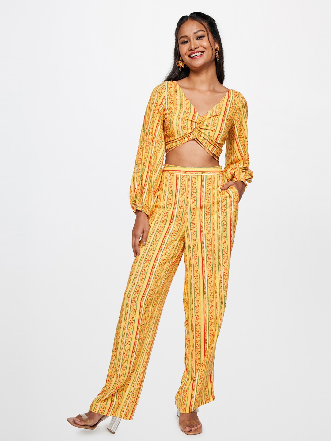 

Global Desi Ethnic Motif Printed V-Neck Ruched Cut-Outs Casual Top with Trousers, Mustard