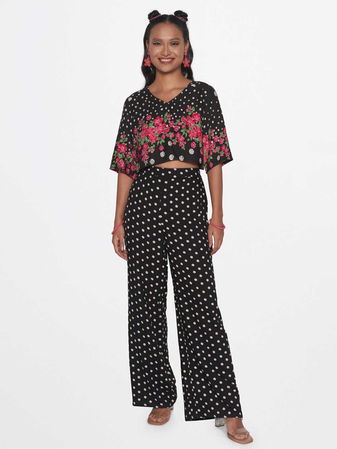

Global Desi Women Black Printed Top with Palazzos