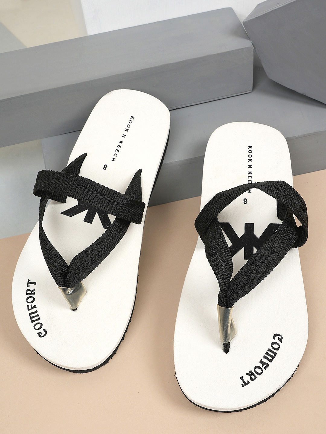 

Kook N Keech Men White & Black Printed Fabric Thong Flip-Flops