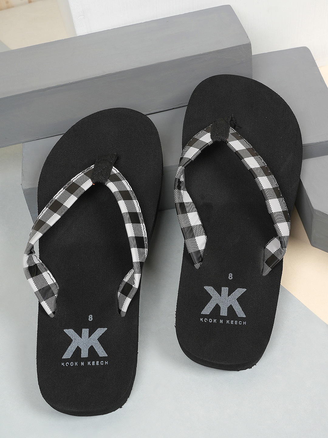 

Kook N Keech Men Black & White Printed Fabric Thong Flip-Flops
