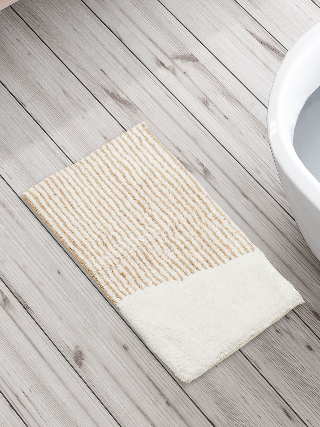 

Home Centre Corsica Auton Beige Striped Pure Cotton 1650 GSM Anti-Slip Bath Mat