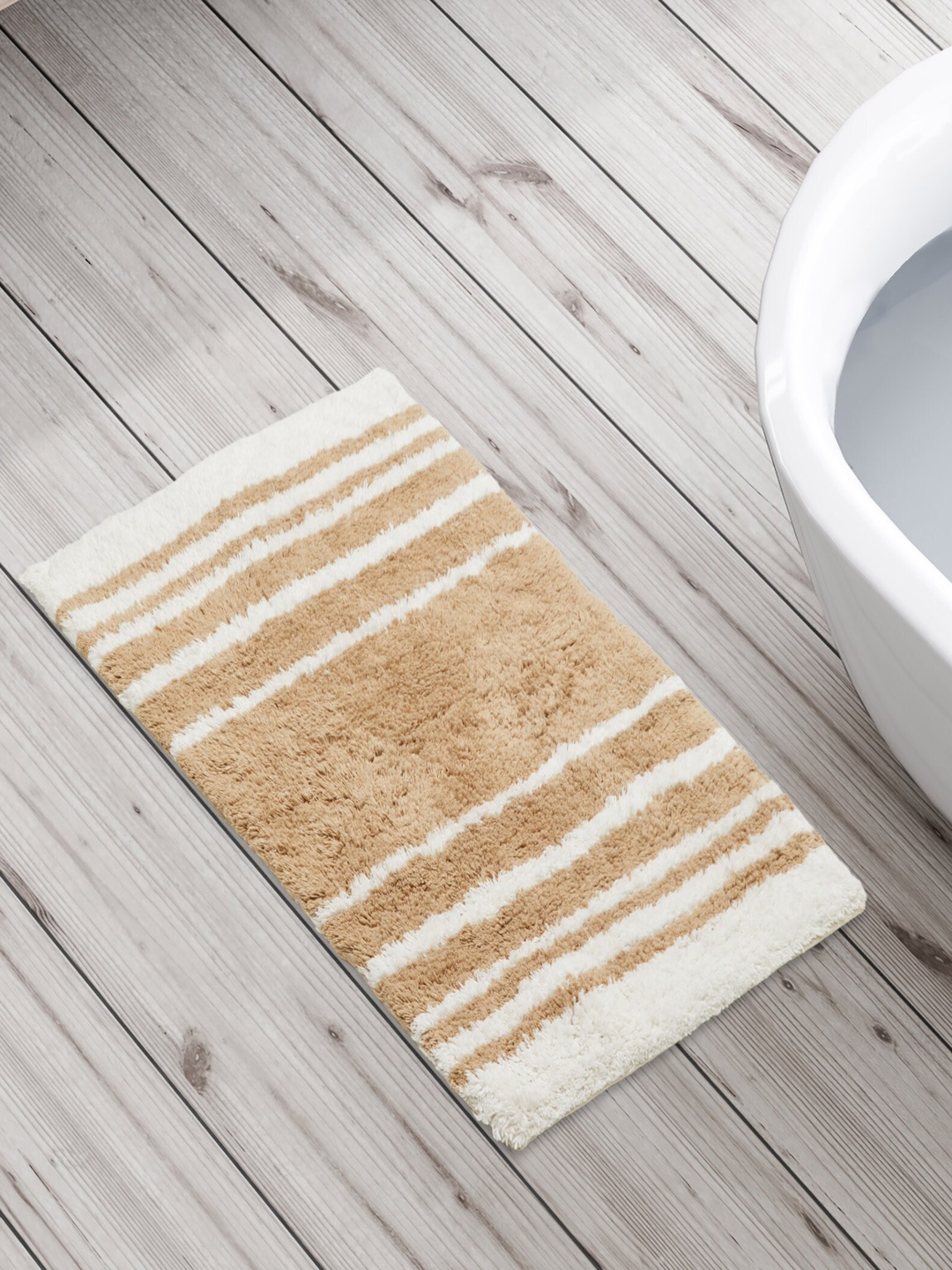 

Home Centre Corsica Auton Beige & Off White Striped Cotton Anti-Slip Bath Rug