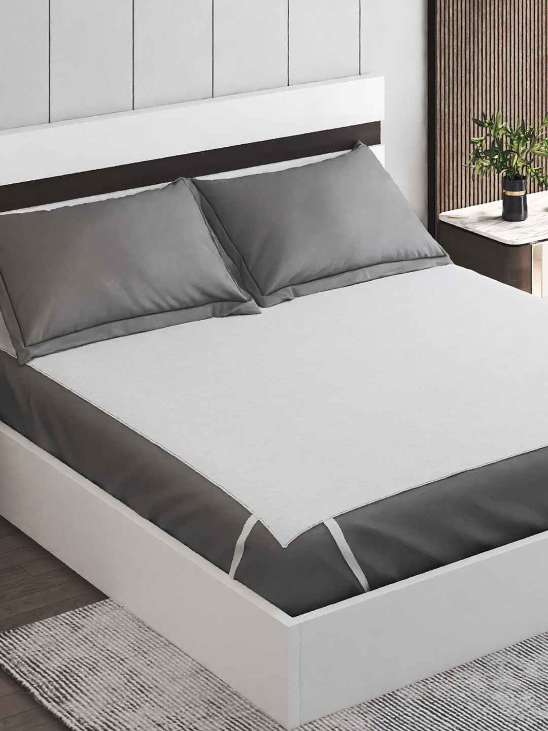 

Home Centre White & Grey 200 GSM Double Queen Mattress Protector