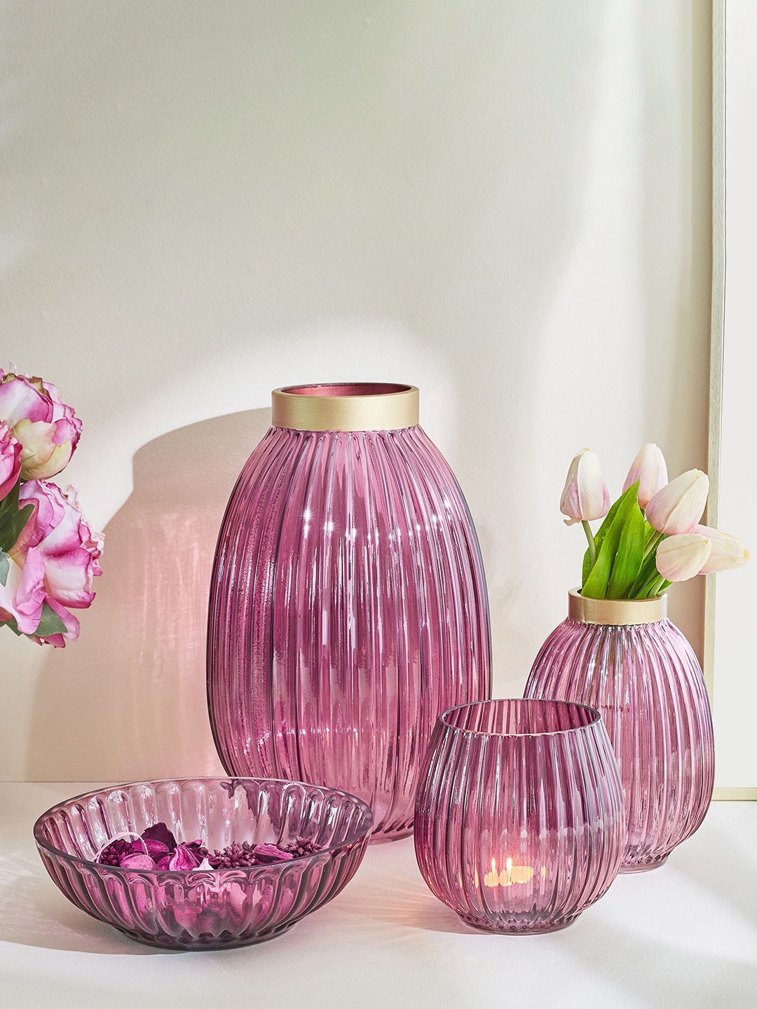 

Home Centre Brian Adora Purple Glass Ribbed T-Light Candle Holder