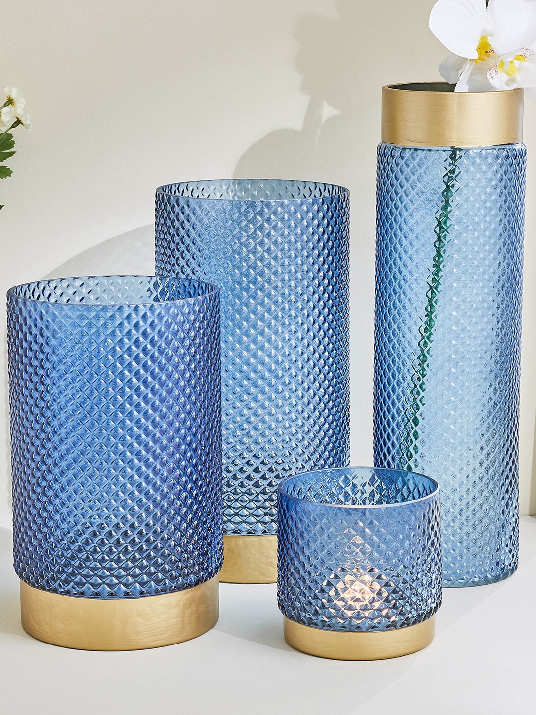 

Home Centre Blue Hurricane Glass Candle Holder