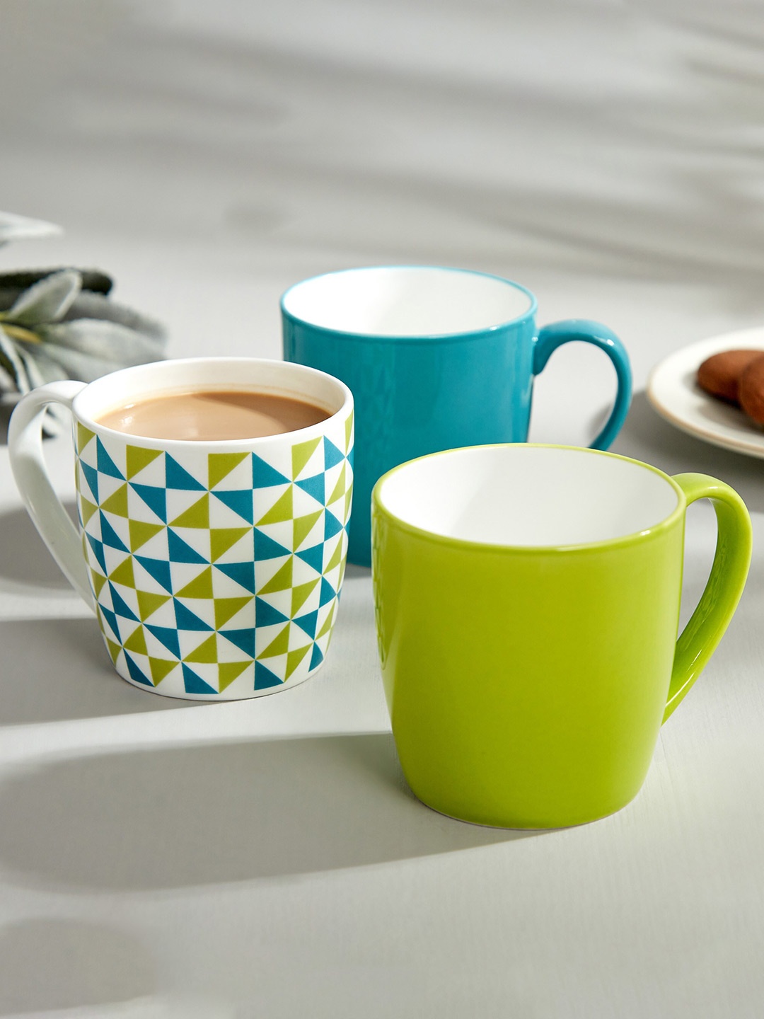 

Home Centre Pacific Heva Green & White Bone China Glossy Mug - 240ml