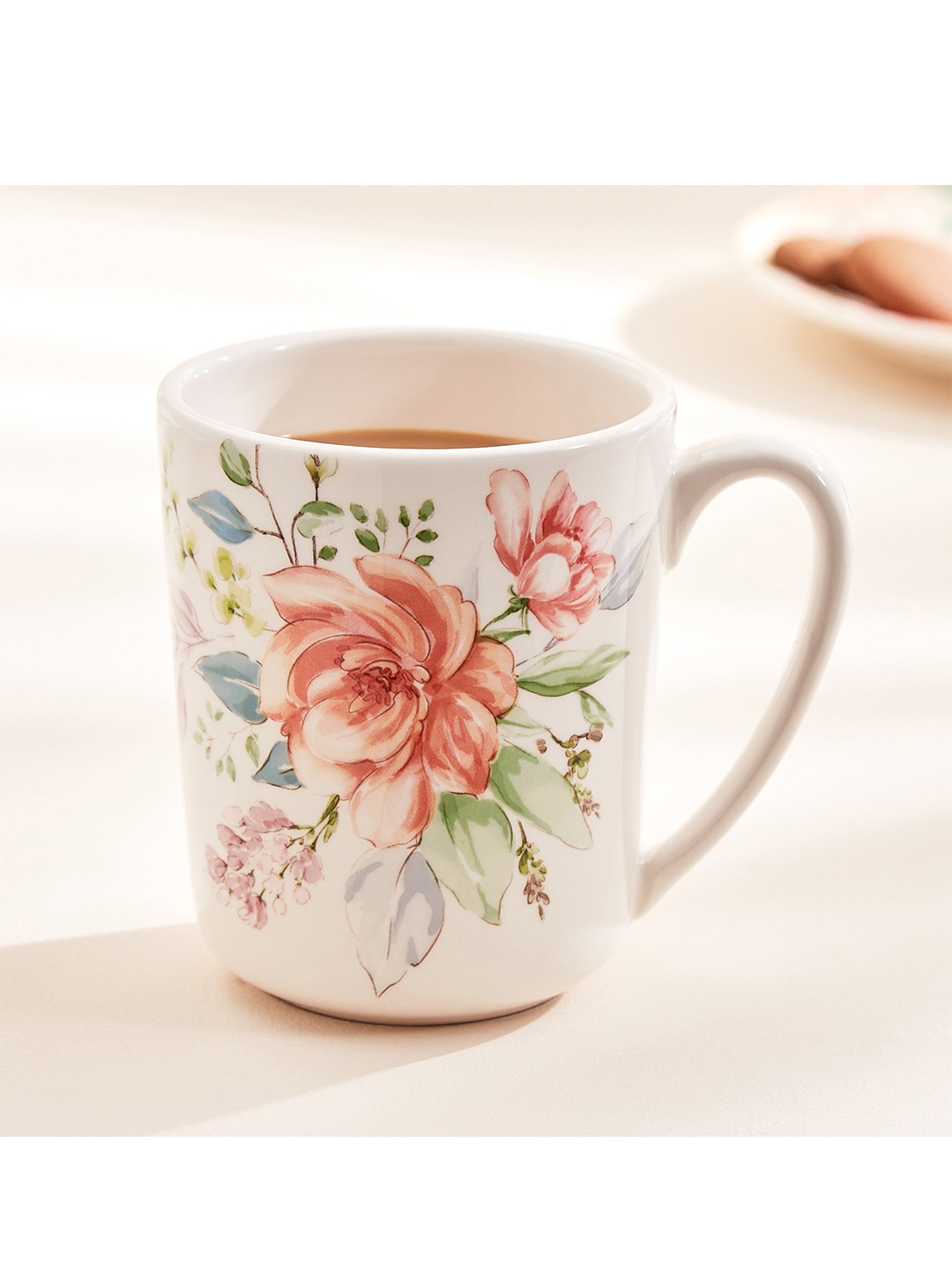 

Home Centre Moksha White Floral Printed Stoneware Matte Coffee Mug - 480ml