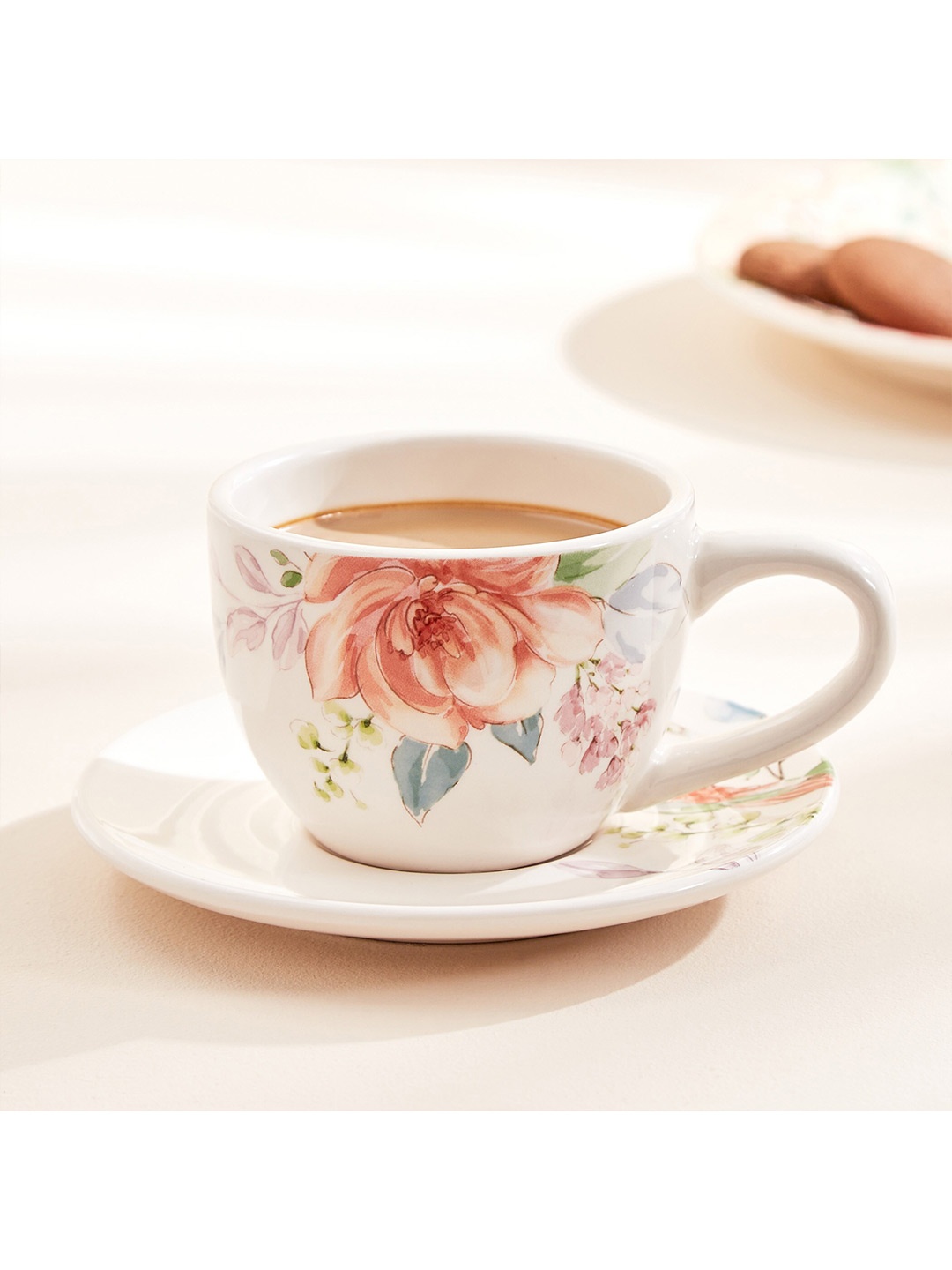 

Home Centre Moksha White Floral Printed Stoneware Matte Cup and Saucer - 230ml