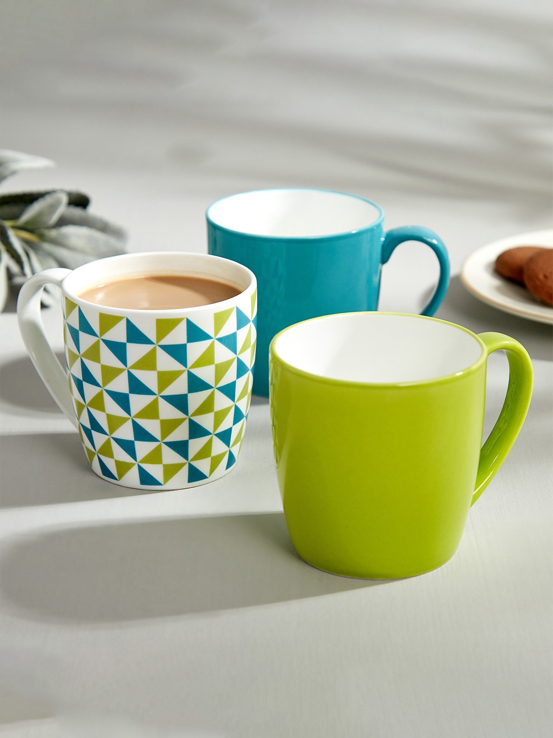 

Home Centre Pacific Heva Teal Blue & White Solid Bone China Matte Coffee Cup - 240 ML