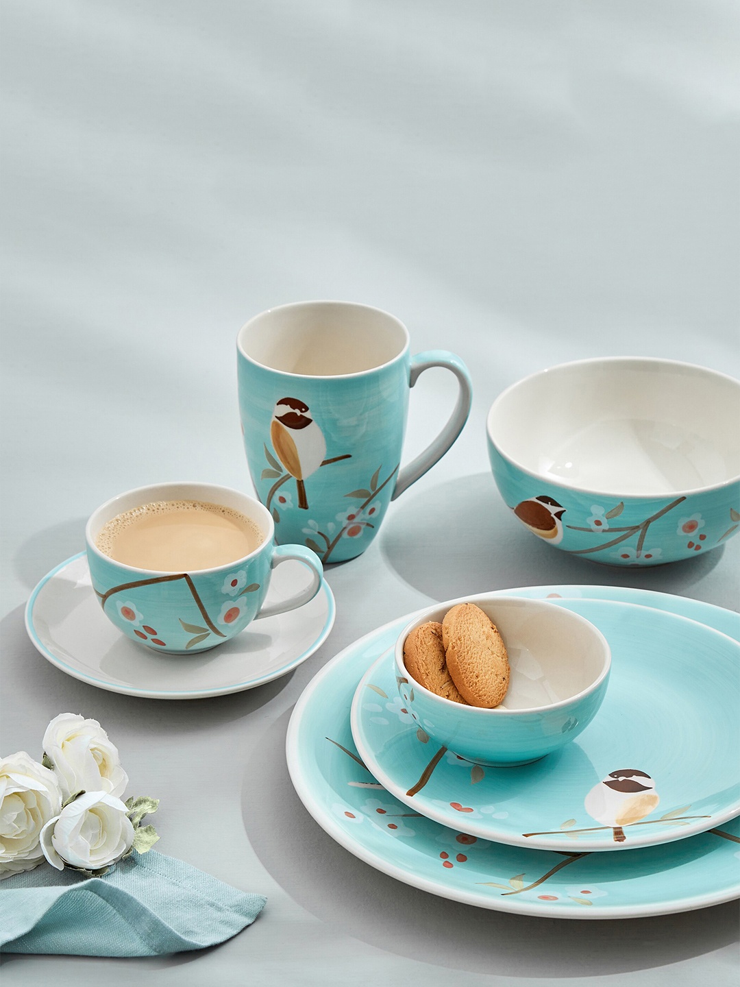 

Home Centre Bespoke Blue & Brown Floral Printed Stoneware Matte Cup and Saucer 230 ml